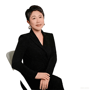 A smiling Asian woman with short dark hair wearing a black suit jacket.